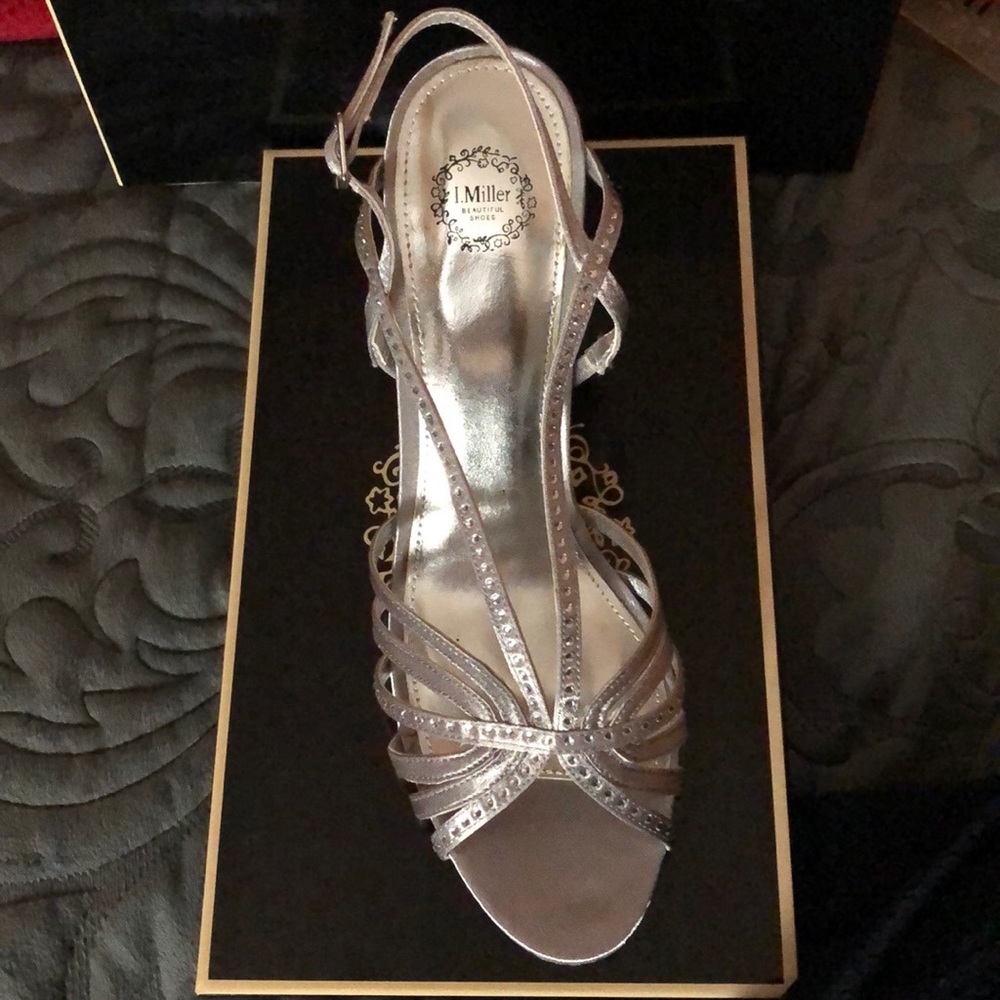 Silver satin and rhinestone 3.5 heel sandal.